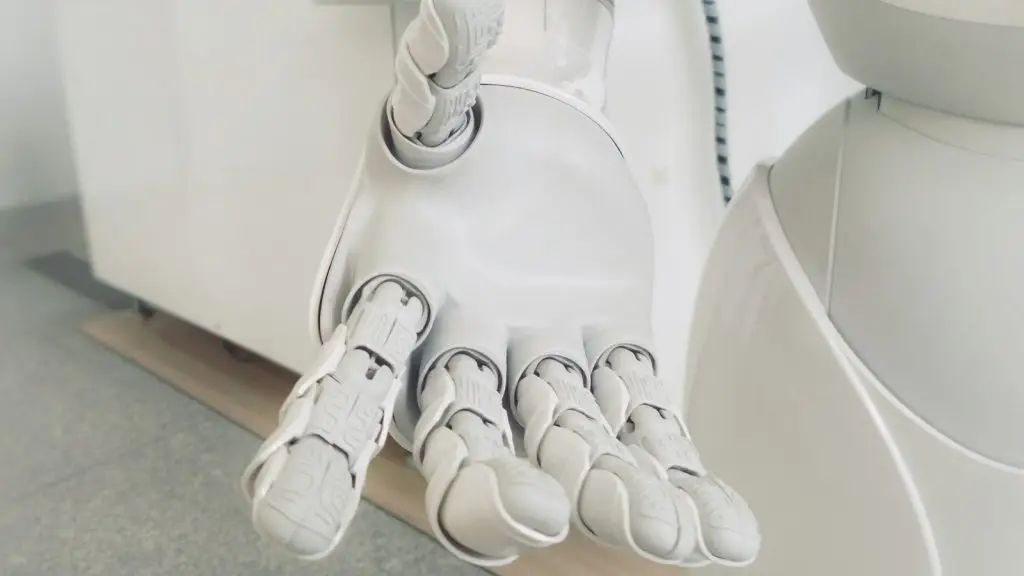 Close-up of a white robotic hand reaching out
