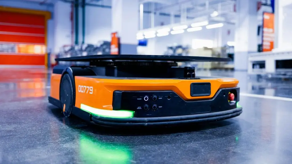 An automated guided vehicle moving parts across a factory without an operator